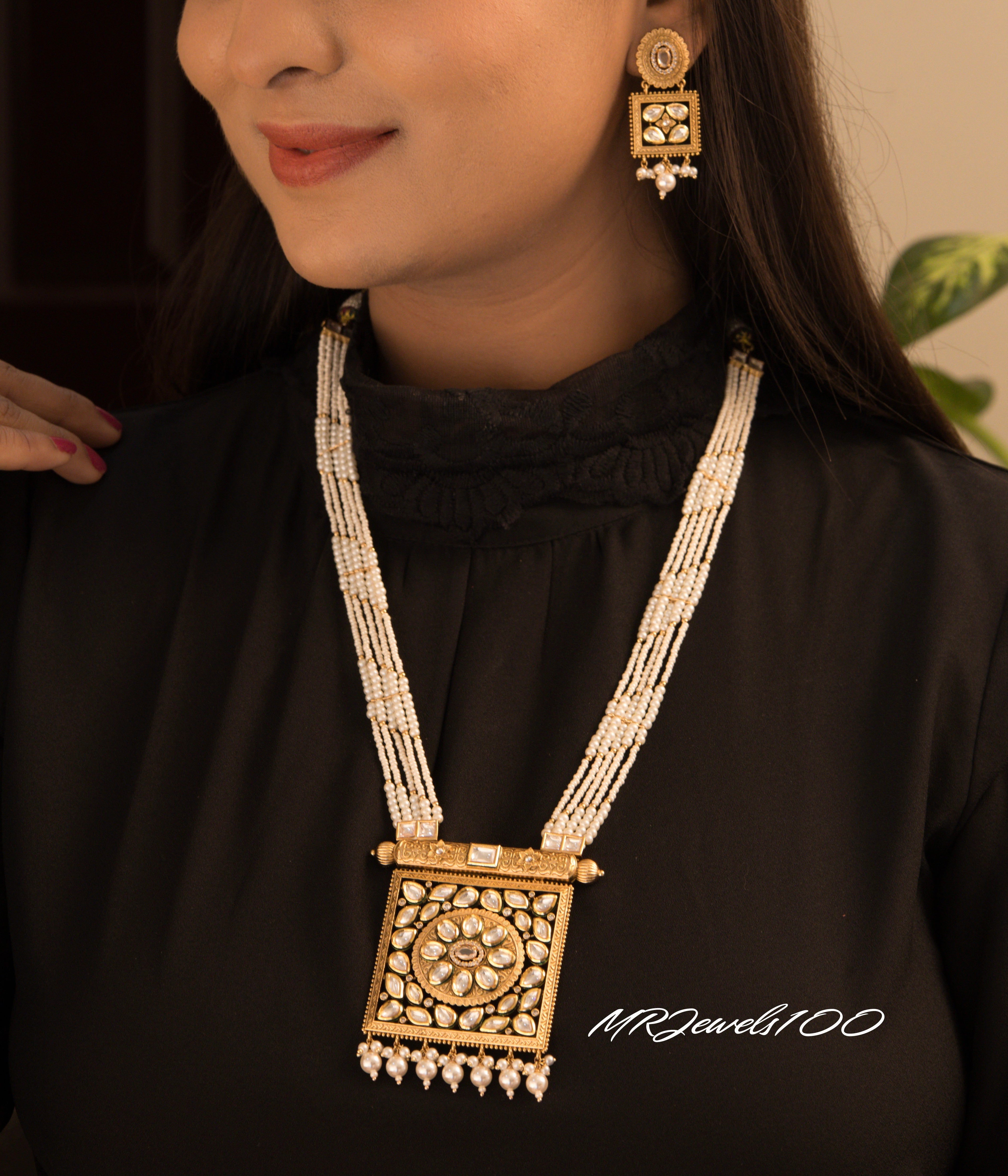 Square kundan pendant necklace with pearl tassels and layered strands, matching earrings included